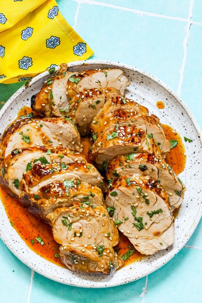 Baked pork tenderloin with teriyaki sauce.
