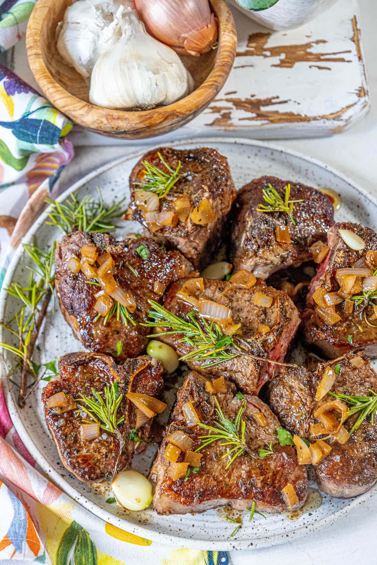 Seared lamb chops with garlic and rosemary.