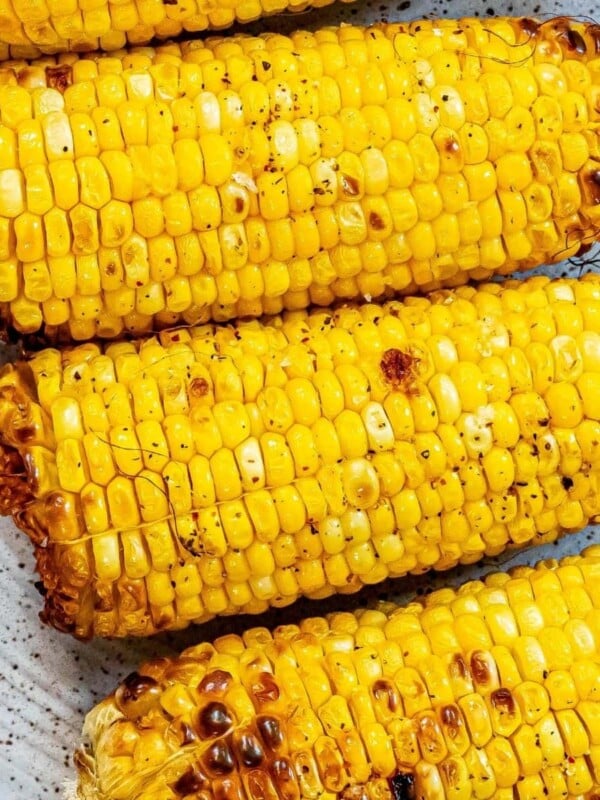 picture of grilled corn on the cob on a plate