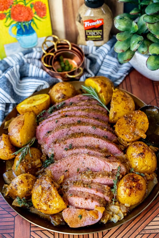 picture of corned beef on a platter with potatoes