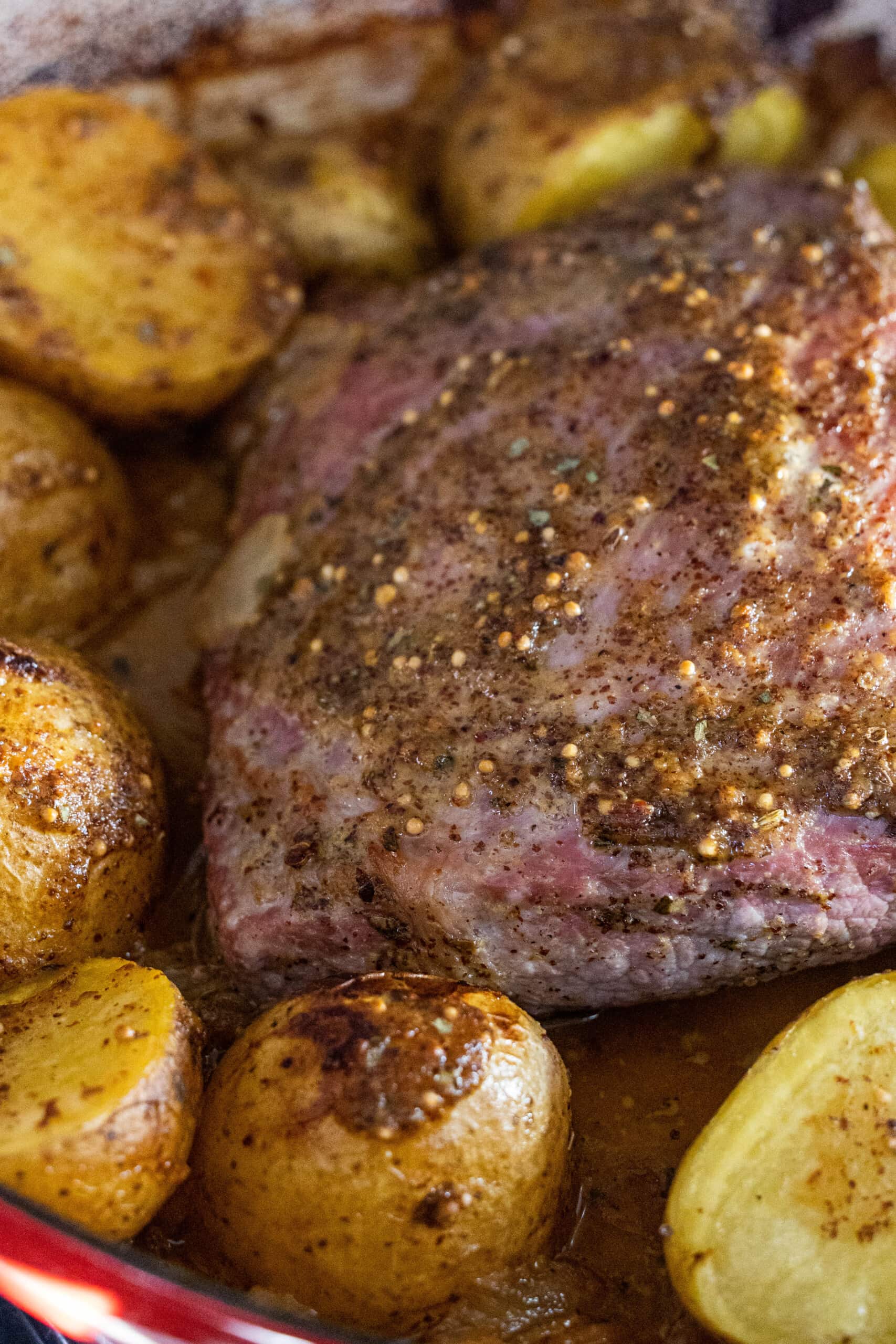 picture of corned beef on a platter with potatoes