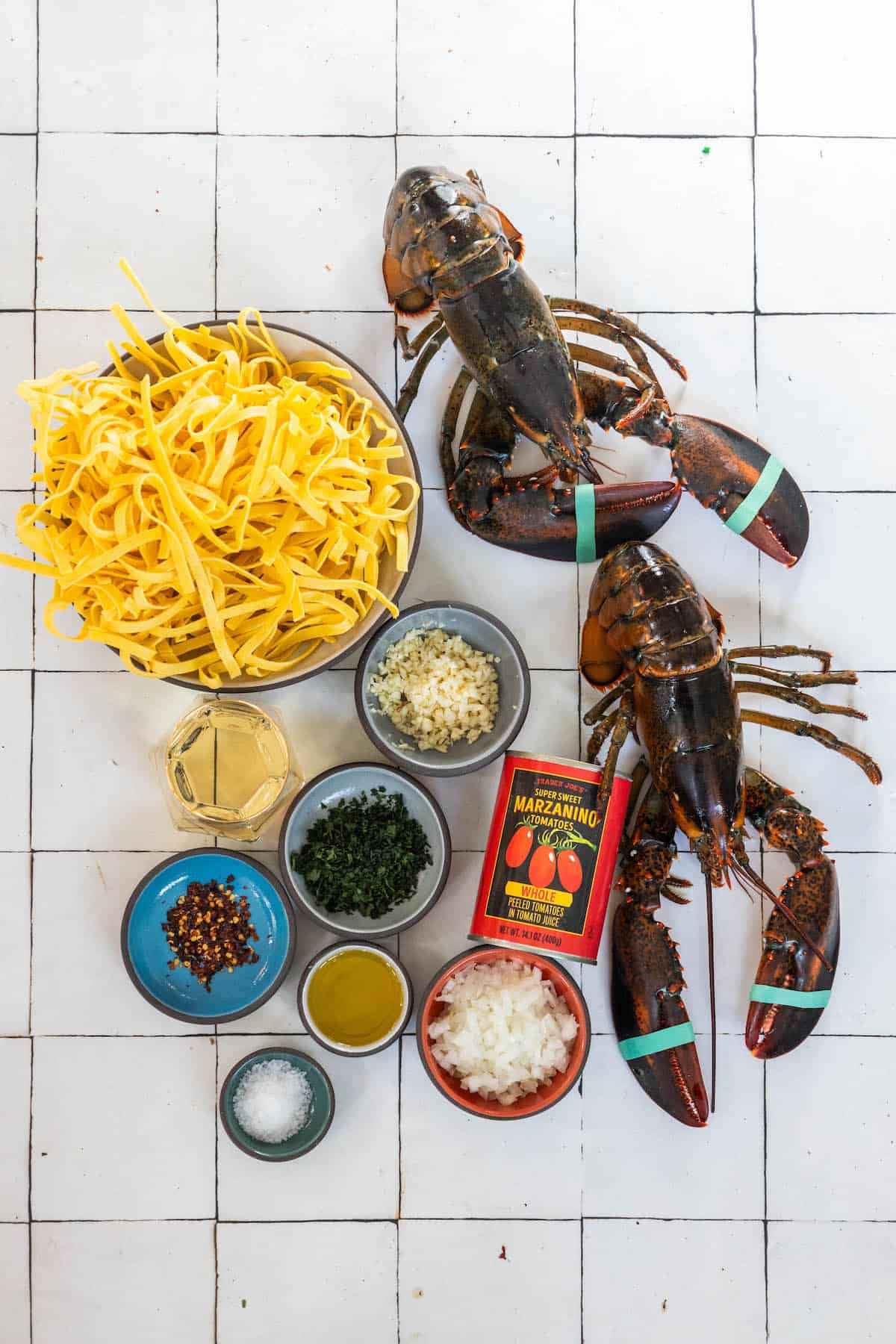 The Venice Busara Pasta consists of Venetian Lobster Busara, best enjoyed on a beautifully tiled floor.