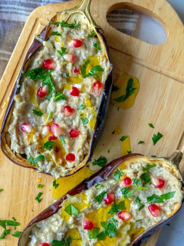 picture of roasted eggplant with tahini and pomegranates and cilantro