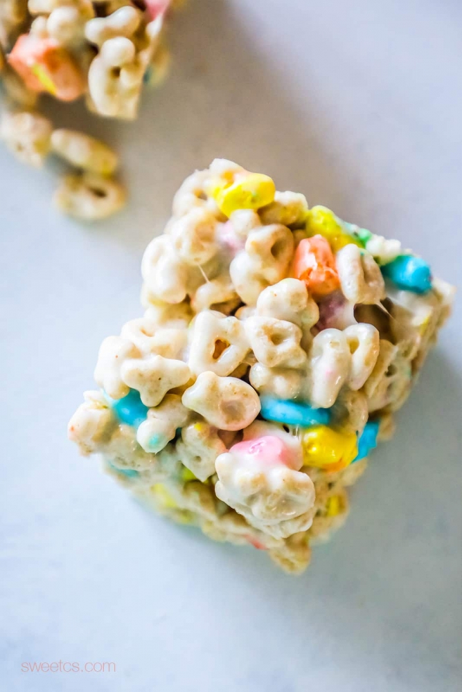 Lucky Charms cereal bars on a white surface.